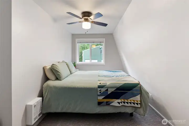 The 2nd bedroom is also upstairs. This room has wall to wall carpet, a ceiling fan and a large window looking out to the front of the property. The 2nd bedroom is also upstairs. This room has wall to wall carpet, a ceiling fan and a large window looking out to the front of the property.