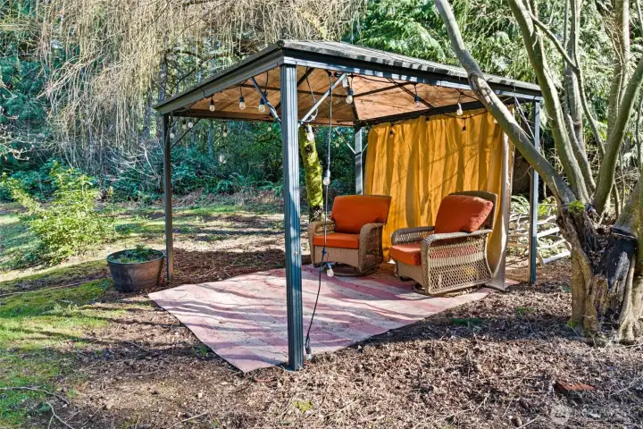 This serene space is great for sharing an adult beverage and chatting about the day. Or grab your favorite fluffy blanket and snuggle up with a good book. This serene space is great for sharing an adult beverage and chatting about the day. Or grab your favorite fluffy blanket and snuggle up with a good book.