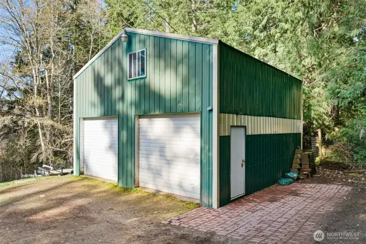 This garage will not disappoint. Space for your cars, tons of storage, and even a shop. This garage isn't just any ordinary garage. This garage will not disappoint. Space for your cars, tons of storage, and even a shop. This garage isn't just any ordinary garage.