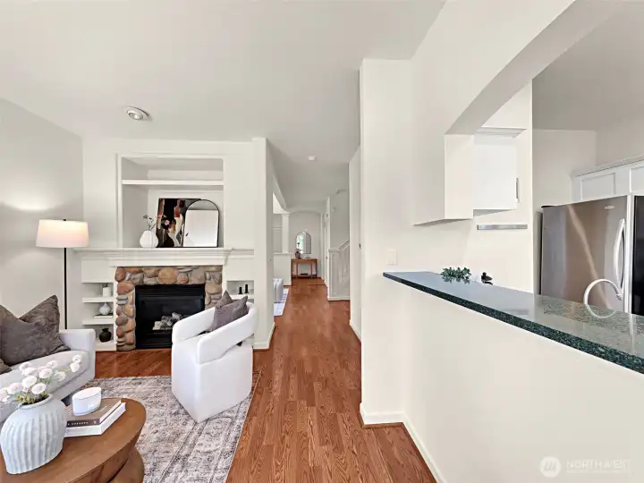 The family room has a cozy gas fireplace, surrounded by built-ins The family room has a cozy gas fireplace, surrounded by built-ins