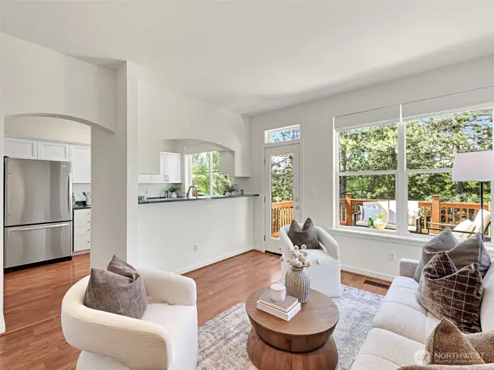 The family room opens up to the back deck. The rear of the home faces southwest, giving it stunning afternoon light. The family room opens up to the back deck. The rear of the home faces southwest, giving it stunning afternoon light.
