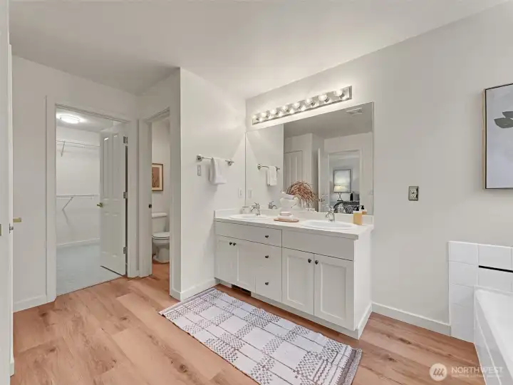 The primary suite bath has a large dual vanity, separate water closet, large walk-in closet, plus linen storage The primary suite bath has a large dual vanity, separate water closet, large walk-in closet, plus linen storage