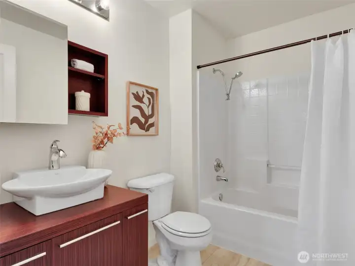 The hall bathroom upstairs has an updated sink vanity The hall bathroom upstairs has an updated sink vanity