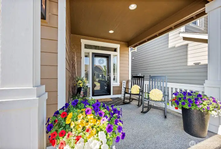 The quaint covered porch has a beautiful transom window and glass storm door to welcome you to this gorgeous home. There are Christmas light outlets in the eaves so you can easily decorate the exterior for the holidays The quaint covered porch has a beautiful transom window and glass storm door to welcome you to this gorgeous home. There are Christmas light outlets in the eaves so you can easily decorate the exterior for the holidays