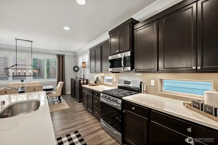 The gas cookstove is an added perk for the home chef and under counter lighting adds a warm ambiance The gas cookstove is an added perk for the home chef and under counter lighting adds a warm ambiance
