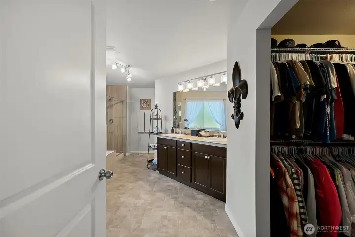 Across from the shower is a dedicated linen closet/added storage for the primary bath Across from the shower is a dedicated linen closet/added storage for the primary bath