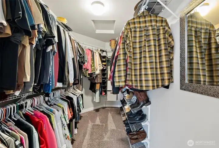 The walk-in closet offers plenty of space for your clothing & accessories The walk-in closet offers plenty of space for your clothing & accessories