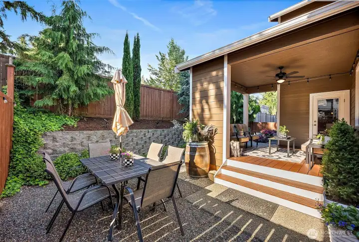 Enjoy charming dining & spaces for relaxing in your low maintenance, fully fenced yard. Front yard maintenance is included in your HOA dues, so you can unwind and let someone else handle yard care. Enjoy charming dining & spaces for relaxing in your low maintenance, fully fenced yard. Front yard maintenance is included in your HOA dues, so you can unwind and let someone else handle yard care.