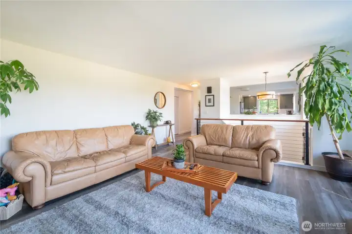 Light and bright living room, opens into dining and kitchen