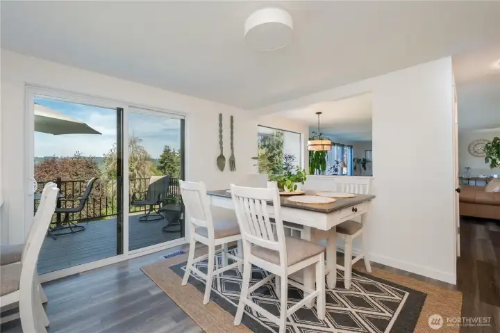 Large sliders lead onto deck with valley views!