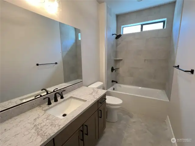 Guest Bathroom - Same floor plan with different finishes.