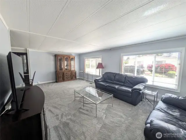 Large living area with picture windows