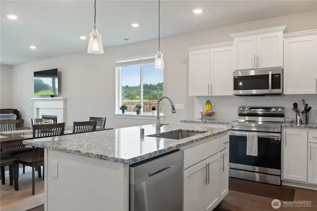 Kitchen with granite and upgraded appliances