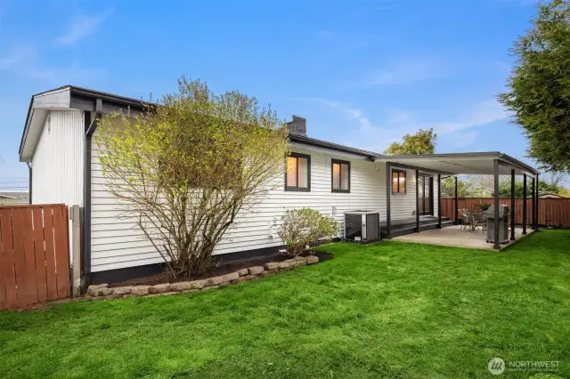 Back yard with covered patio