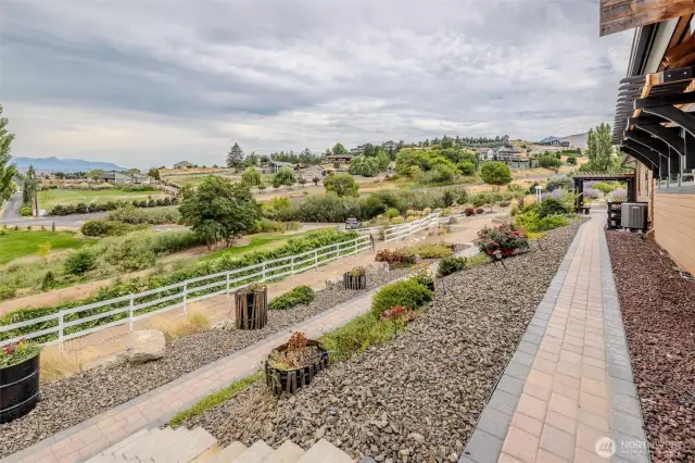 Terraced multi-level bricked pathways around the property