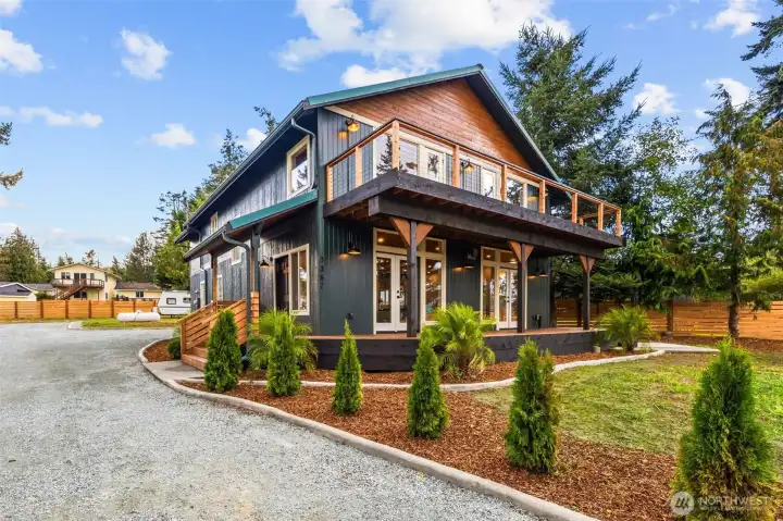 New decks and fresh exterior paint plus landscaping offer curb appeal.