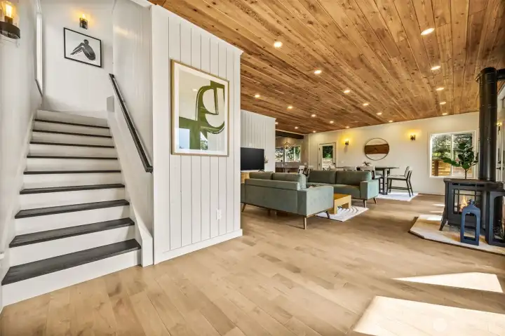 Maple and tile flooring throughout.  Ship lap walls provide texture and wood accents give a warm feeling.