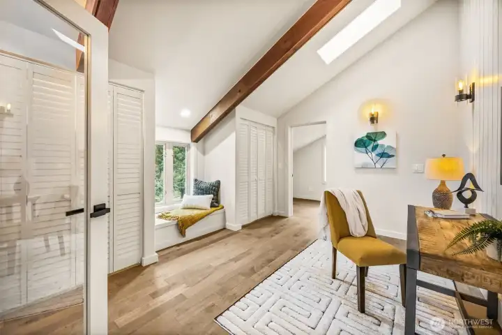 Office, den, work out space...  The upstairs has solid wood beams and skylights for a bright interior.