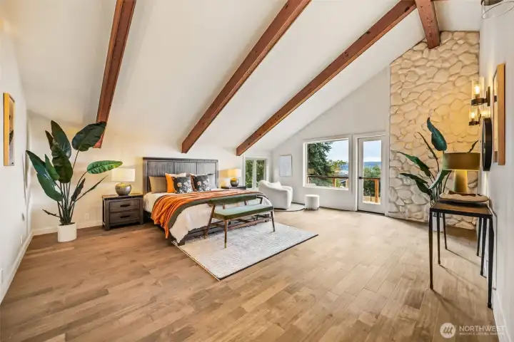 Primary bedroom is large enough for all your furniture and a seating area.  Again here you can walk out to the upstairs deck.