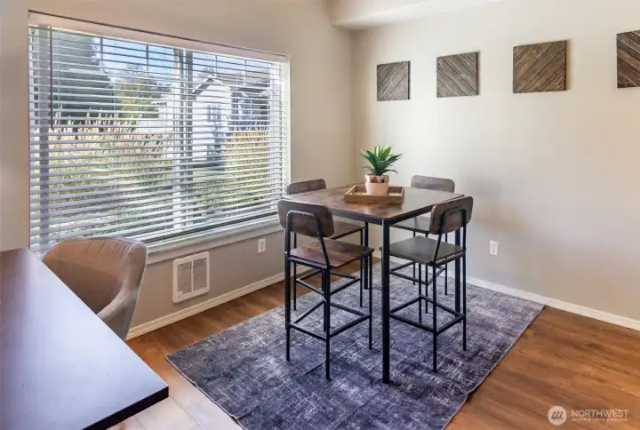 The spacious and light filled dining room creates a wonderful dining area.