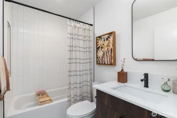 Photos are for illustrative purposes only & may  depict a different floor plan, finishes, or features than the actual home for sale. Actual layout & specifications vary.