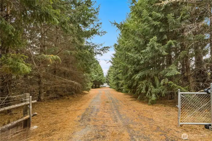 This original shared driveway is also on the property with easement to serve the neighboring property.