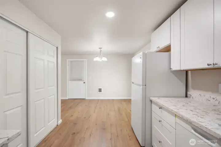 Looking back towards the dining room. There is a huge pantry on the left.