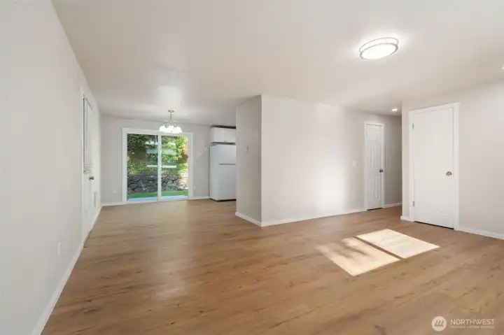 The living area opens to the dining room