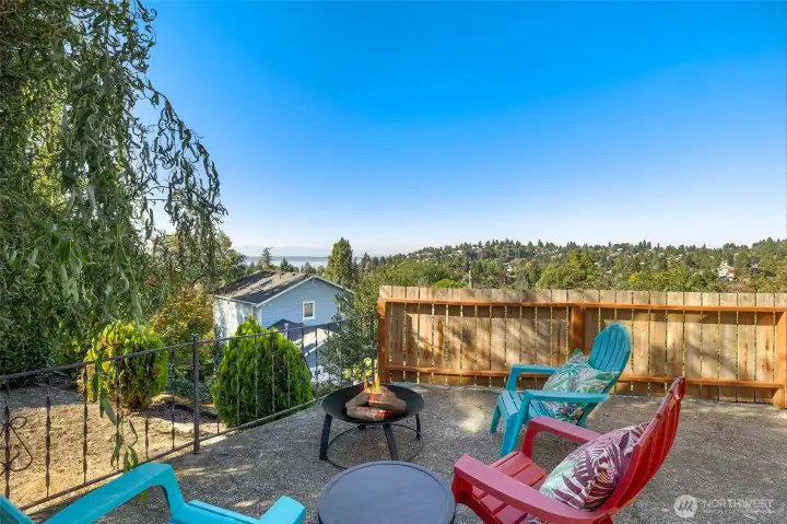 Another space to get away… The lower patio has a view and offers multiple levels of entertaining. Enjoy yourself around the fire pit while watching the ferries roll by.