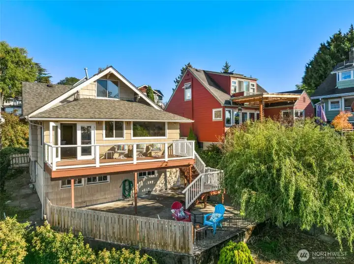 Wonderful drone shot of the back of the house. Please take note of the beautiful and unique, Corkscrew Willow tree.