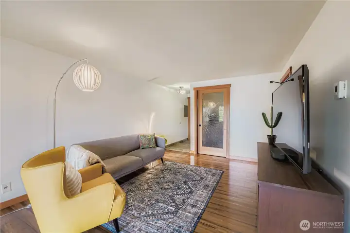 Custom woodworking and carved glass sliding door.