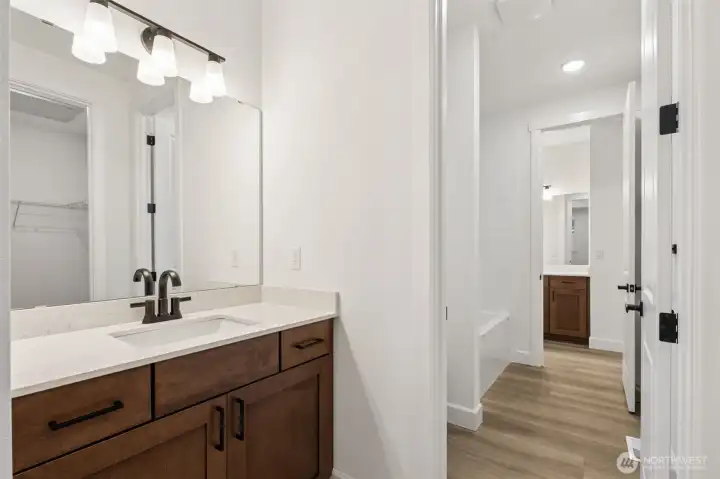 Two of the secondary bedrooms joined by Jack and Jill Bathroom. Each with own separate vanity.