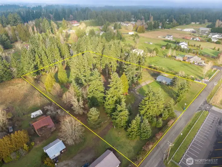 Desirable rural property off Rich Rd near East Olympia Elementary is just shy of 4 acres.  3 bedroom, 2 full bath manufactured home meticulously updated in 2023.