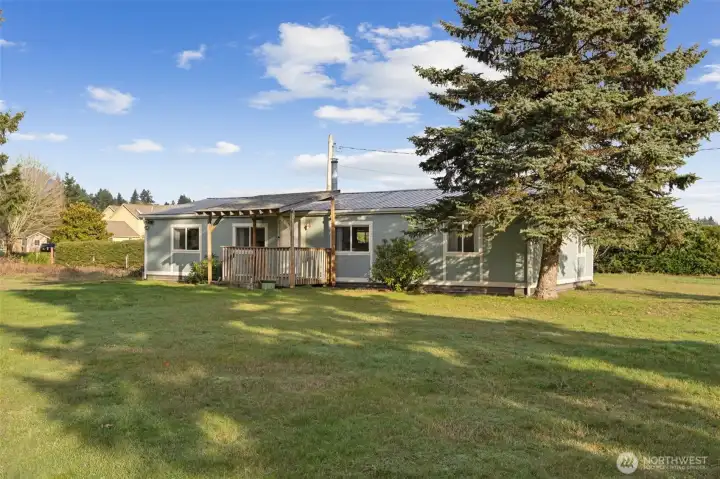 View of home.  New roof, interior/exterior paint, cabinets, trim, flooring, appliances in 2024.