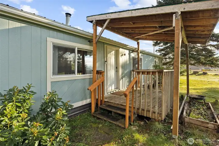 Covered front entrance to home.