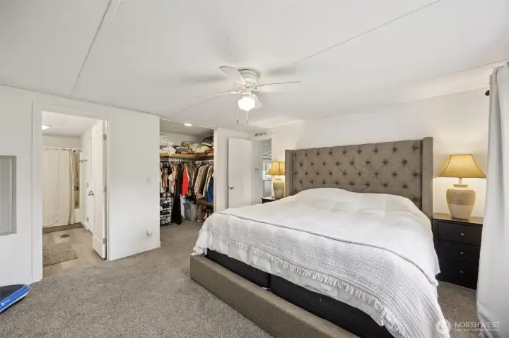 Generous primary bedroom with walkin closet and full private primary bath.  New carpet, trim and paint in 2024 and new bathroom cabinetry/fixtures as well!