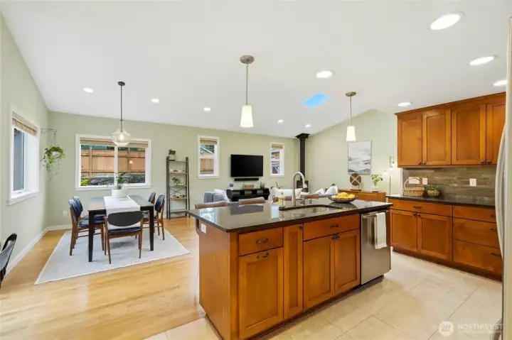 The kitchen is open to the huge family and dining rooms for a wide open feel.