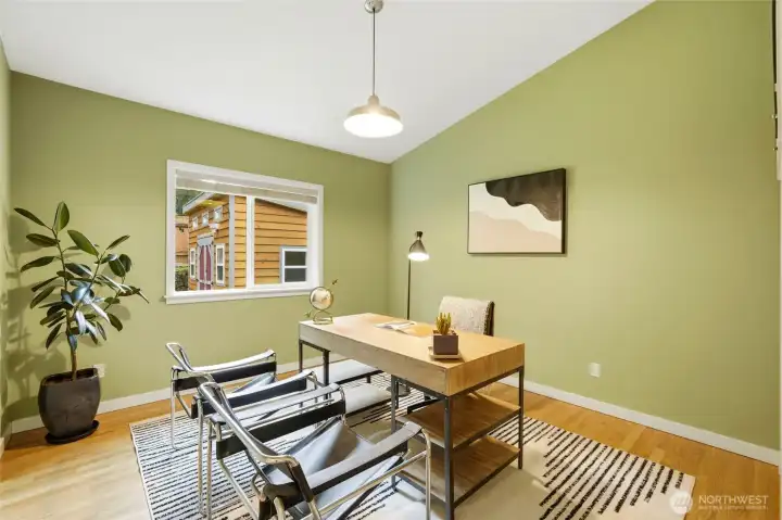 Part of the renovation includes a vaulted 4th bedroom (or office) with more of those beautiful hardwoods!