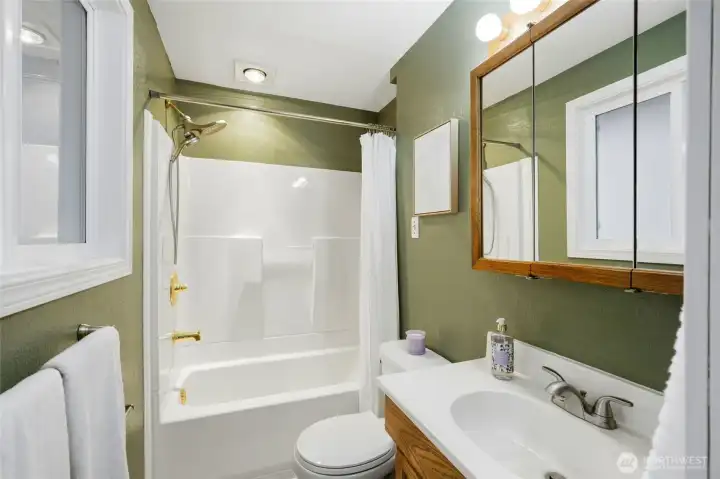 Convenient full bath off the primary bedroom.