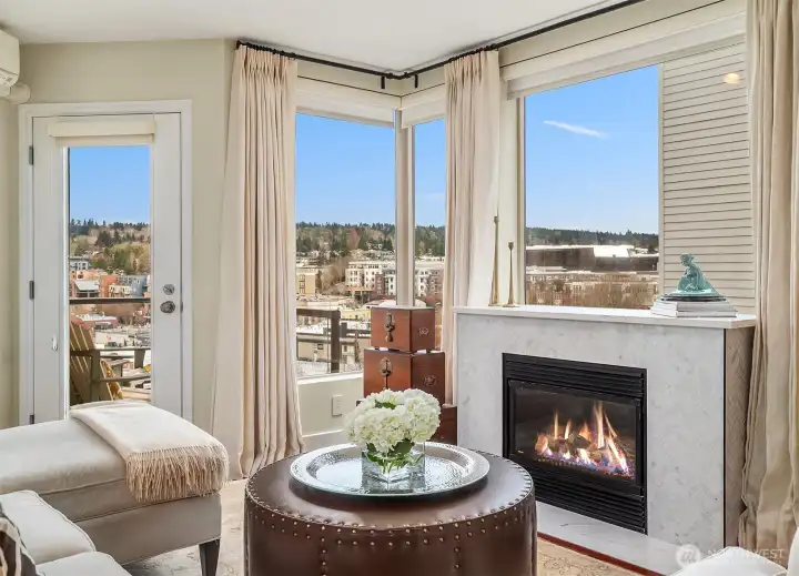 Welcome to your South East Corner View Home at Waterview Condominiums. Lovely views over Downtown Kirkland and a gas fireplace to keep you warm and cozy on those cool evenings along with AC for warm summer days.