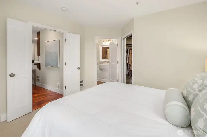 Primary suite with walk in closet with custom built in's.