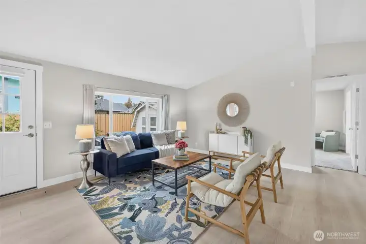 Step through the front door into a bright, welcoming living room—perfect for relaxing, gathering, and everyday living.