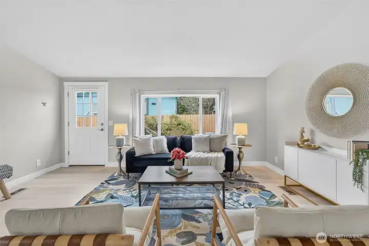 Looking through the kitchen’s pass-through window, conversations flow easily—keeping everyone connected while meals and moments are shared.