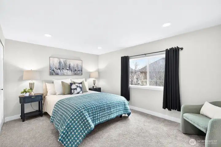 The primary bedroom offers a private ¾ ensuite bath for added comfort and convenience.