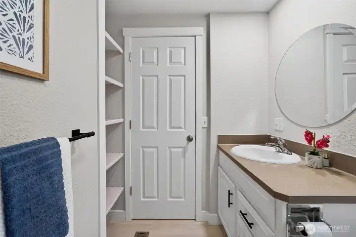 With built-in shelving and smart storage, the ensuite is designed to keep everything organized, functional, and effortlessly tidy