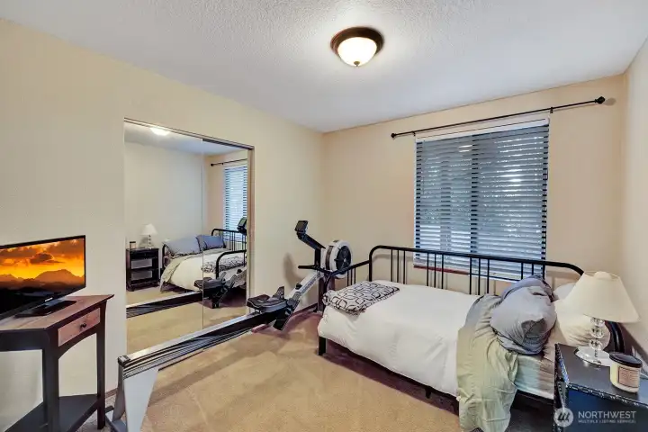 #1 of 2 Guest bedrooms. Just steps to the full guest bathroom. Accommodate a daybed, full bed or use as an exercise room. You decide.