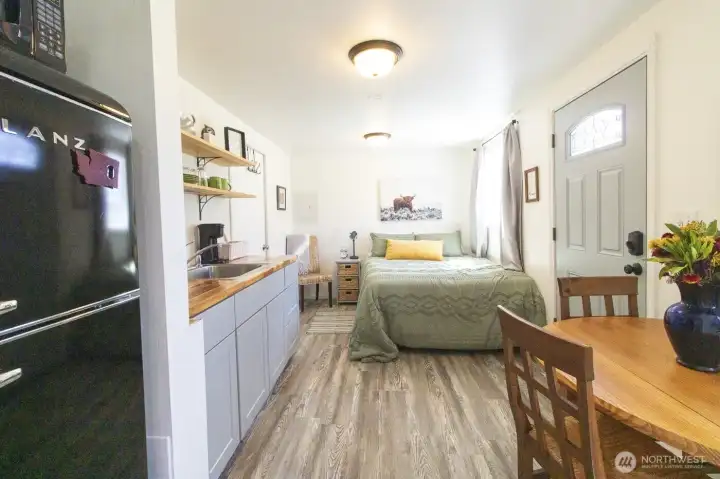 Interior of detached Airbnb/guest space with open-concept living/kitchen area