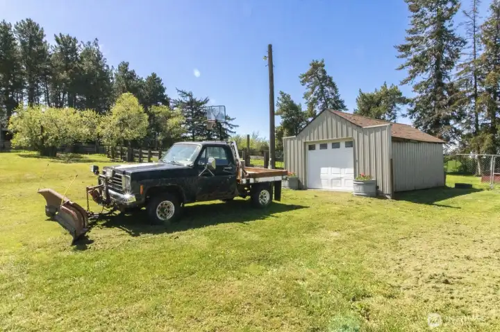 Detached storage shed and working chevy snow plow (included)
