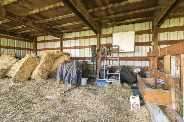 Interior of hay shed with ample storage for hay, equipment, or livestock needs