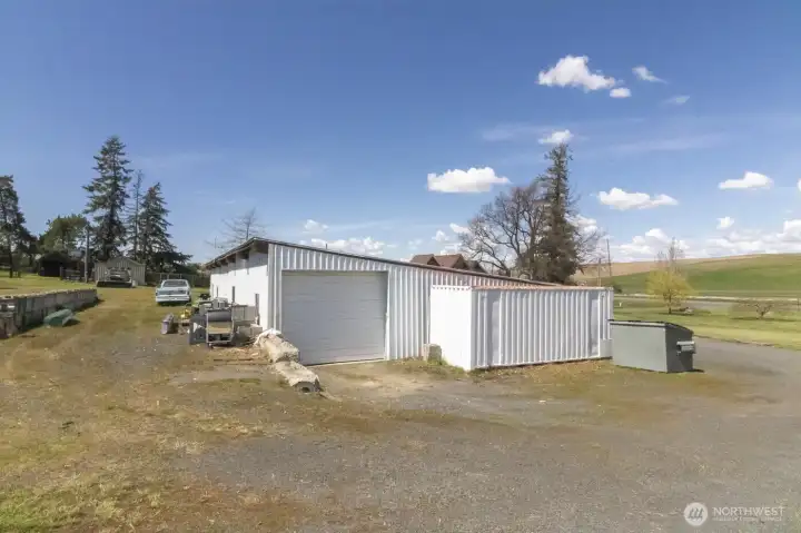 Detached 5-bay shop with convenient access and versatile use potential!